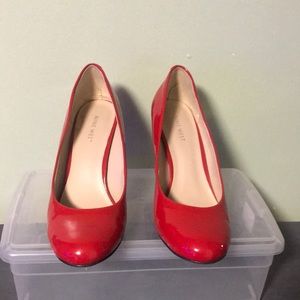 Red patent leather pumps. Nine West. Good condition.